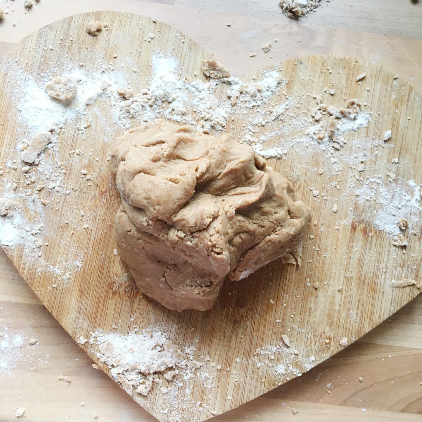 The dough on a lightly floured chopping board