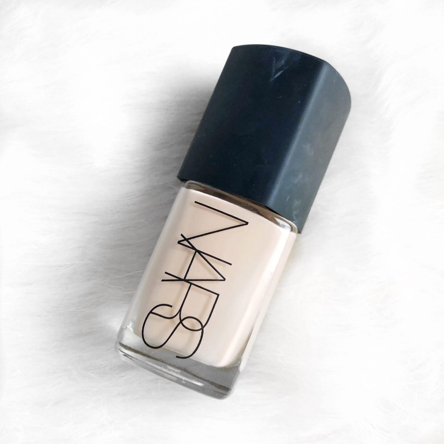Nars Sheer Glow foundation on a white background