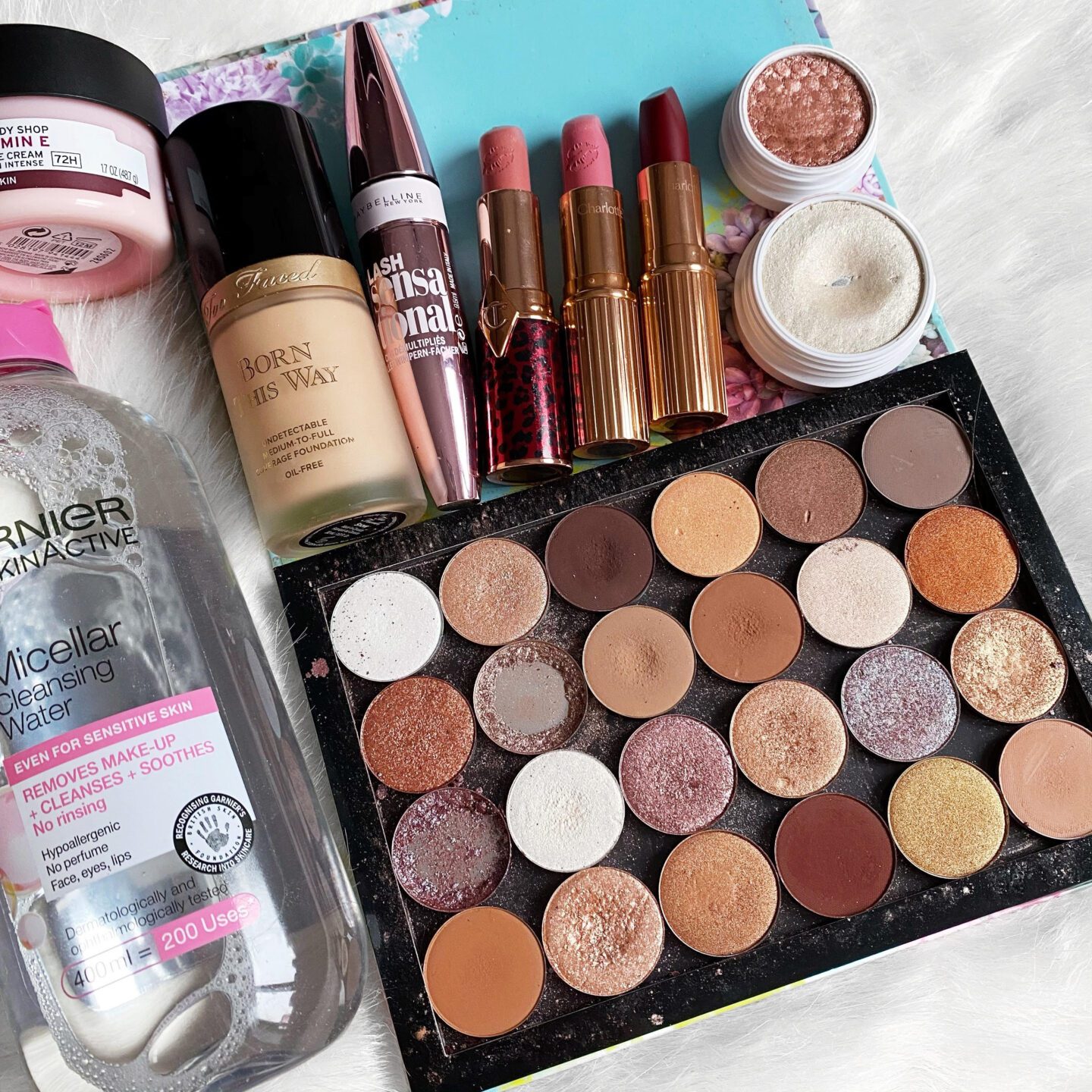 Makeup and Skincare flatlay of Holy Grail Beauty Products