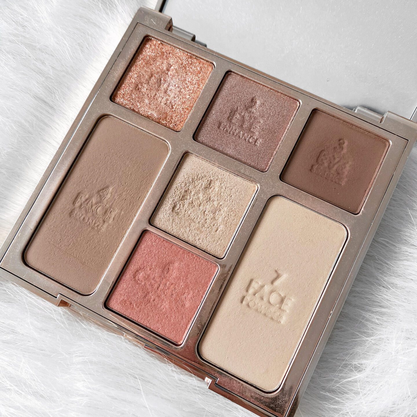 Close up of the shades inside the Charlotte Tilbury Look of Love palette