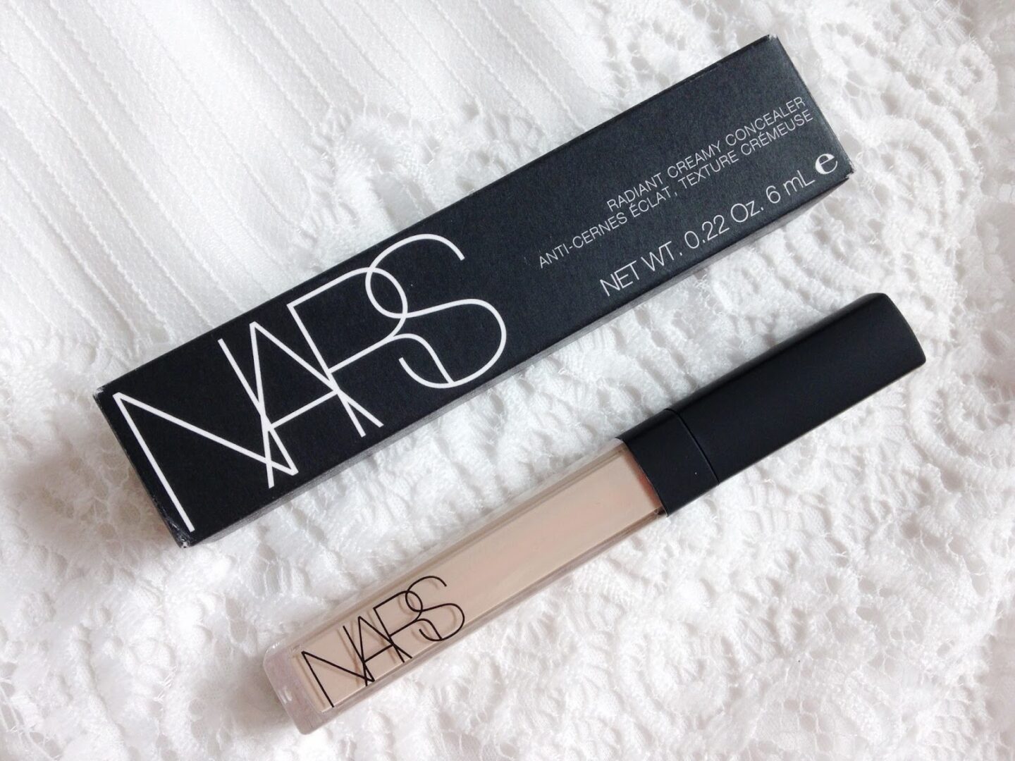NArs radiant creamy concealer next to the box